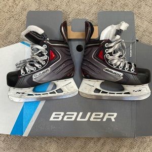 Youth hockey skate. Size 2 US. Worn but still useful for a young skater.